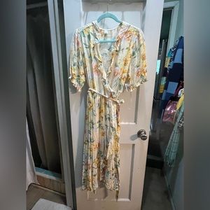 Old navy yellow floral wraparound dress. Brand new.